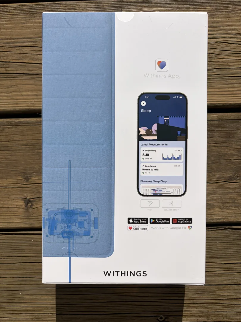face arrière de la boîte avec l'app et les mentions de compatibilité